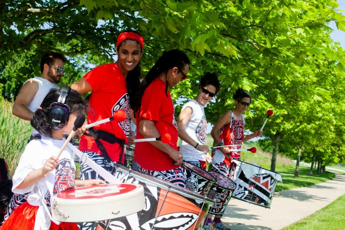Members of the Afro-Brazilian band Batalá perform at the Navy Yard during the Anti-Defamation League's Walk Against Hate (Brad Larrison for WHYY)