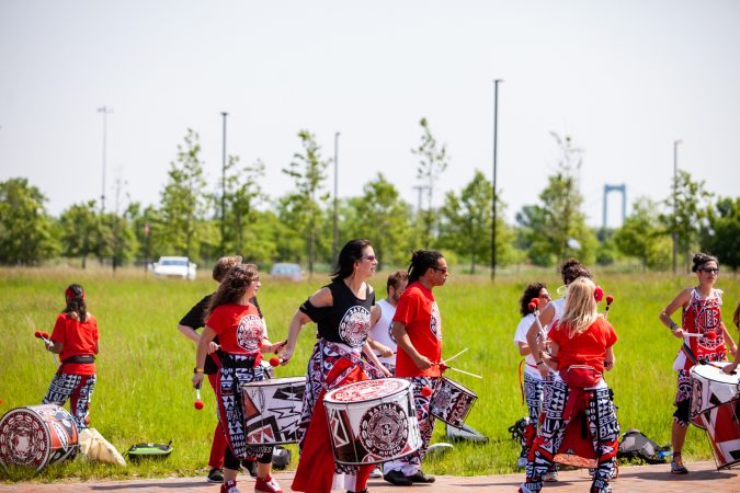 Members of the Afro-Brazilian band Batalá perform at the Navy Yard during the Anti-Defamation League's Walk Against Hate (Brad Larrison for WHYY)