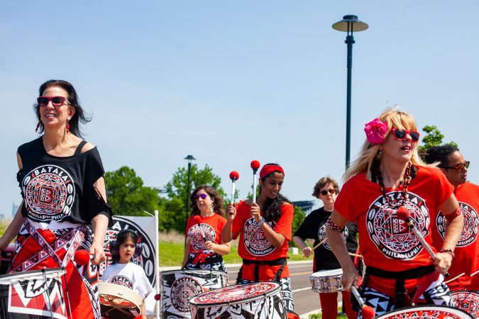 Members of the Afro-Brazilian band Batalá perform at the Navy Yard during the Anti-Defamation League's Walk Against Hate (Brad Larrison for WHYY)