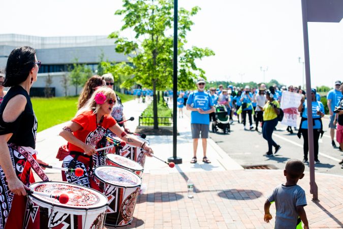 Members of the Afro-Brazilian band Batalá perform at the Navy Yard during the Anti-Defamation League's Walk Against Hate (Brad Larrison for WHYY)