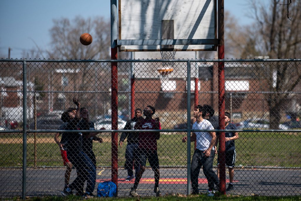 20190406_WHYY_Mayfair-_089-rs A group of boys play a game of basketball at Vogt park in Mayfair on Saturday, April 6, 2019. (Kriston Jae Bethel for WHYY)