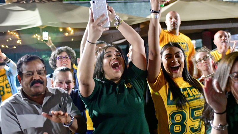 Supporters cheer Maria Quiñones-Sanchez. who defeated Angel Cruz to keep her seat on City Council. (Bastiaan Slabbers for WHYY)