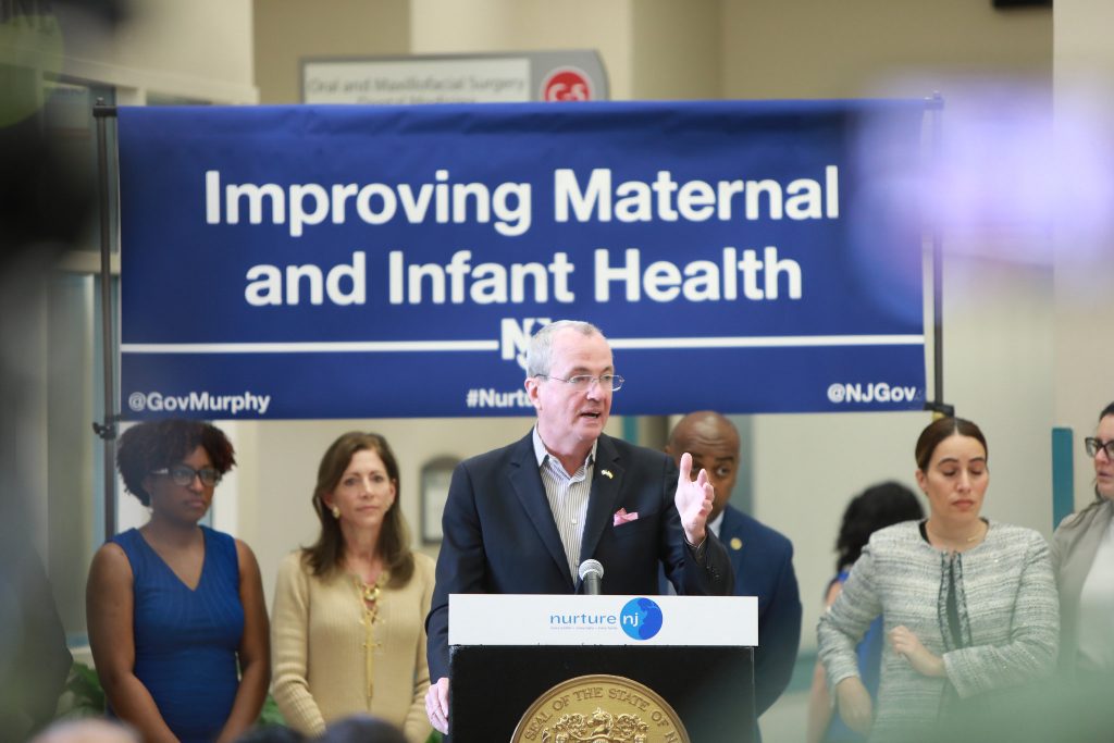 Governor Phil Murphy signs legislation on maternal health joined by First Lady Tammy Murphy, legislators, Newark mayor Was Baraka, and community leaders at University hospital on Wednesday May 8, 2019. Edwin J. Torres/GovernorÕs Office. Governor Phil Murphy signs legislation on maternal health joined by First Lady Tammy Murphy, legislators, Newark mayor Was Baraka, and community leaders at University hospital on Wednesday May 8, 2019. (Courtesy of Edwin J. Torres/Governor's Office)