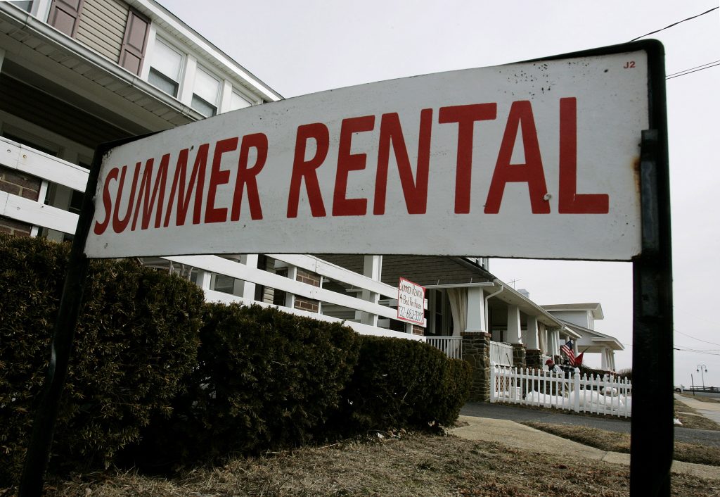 Smart Spending Summer Rentals In this file photo, a summer rental sign is seen in front of a home just one block from the ocean, in Belmar, N.J. (Mel Evans/AP Photo, file)
