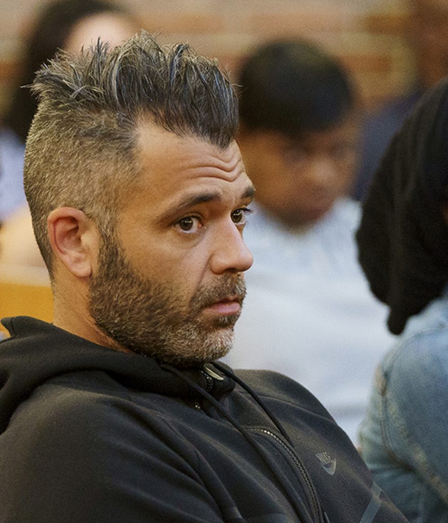 Helpful Homeless Man Mark D'Amico sits in Burlington City Municipal Court where he appeared regarding citations for driving with a suspended license, in Burlington City, N.J., Tuesday, Sept. 18, 2018. (Jessica Griffin/The Philadelphia Inquirer via AP, Pool)