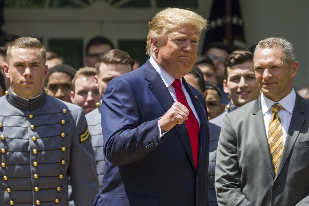 Donald Trump President Donald Trump pumps his fist as he departs after the presentation of the Commander-in-Chief's Trophy to the U.S. Military Academy at West Point football team, in the Rose Garden of the White House, Monday, May 6, 2019, in Washington. (Alex Brandon/AP Photo)