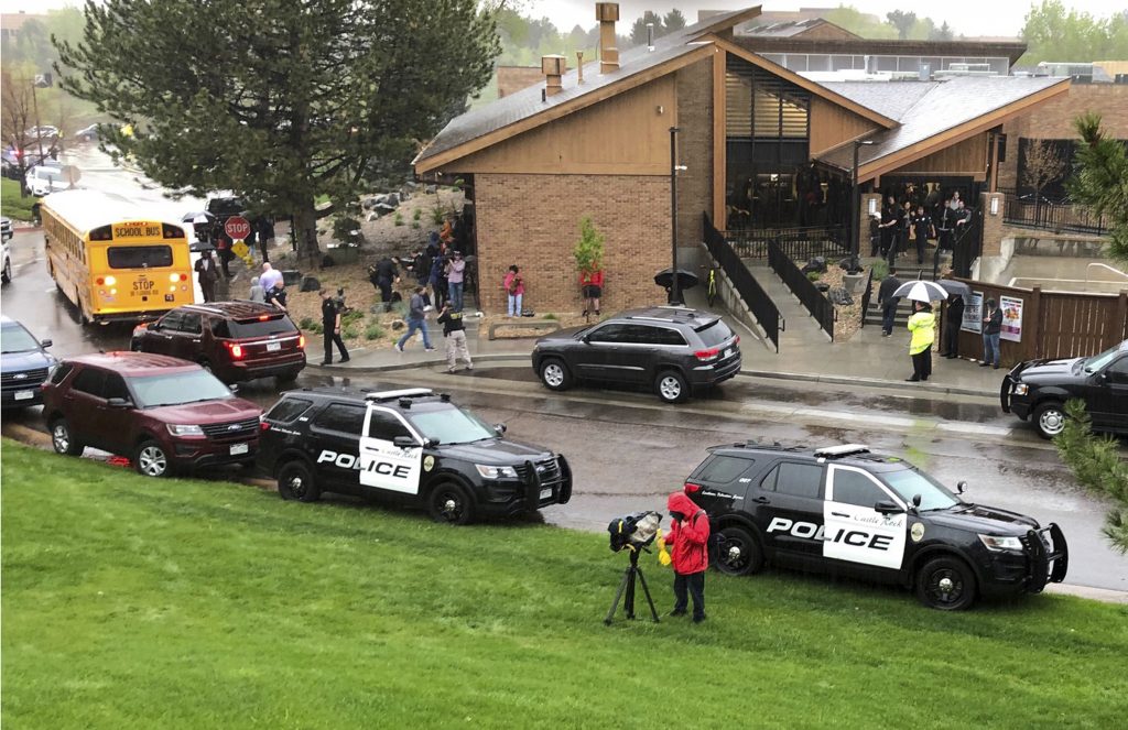 School Shooting Colorado Police and others are seen outside STEM School Highlands Ranch, a charter middle school in the Denver suburb of Highlands Ranch, Colo., after a shooting Tuesday, May 7, 2019. Authorities said several people were injured and a few suspects were in custody. (David Zalubowski/AP Photo)