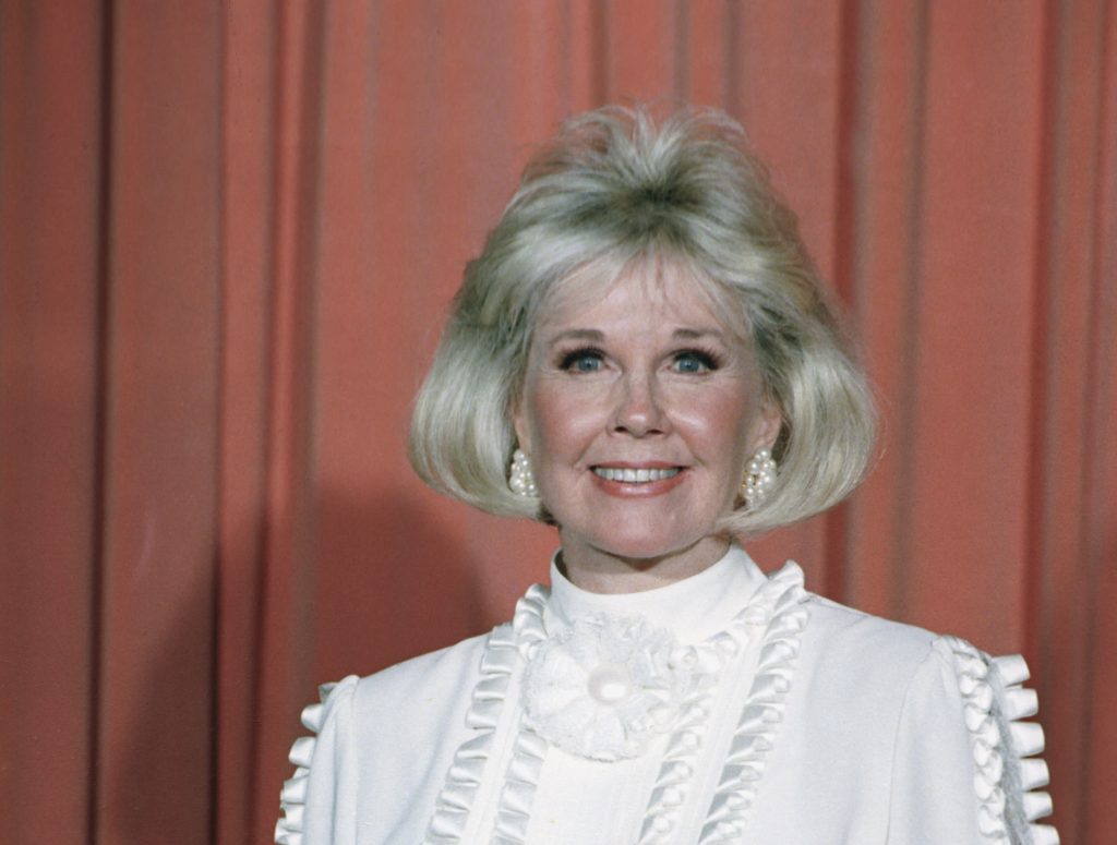 Doris day FILE - In this Jan. 28, 1989 file photo, actress and animal rights activist Doris Day poses for photos after receiving the Cecil B. DeMille Award she was presented with at the annual Golden Globe Awards ceremony in Los Angeles. Day, whose wholesome screen presence stood for a time of innocence in '60s films, has died, her foundation says. She was 97. The Doris Day Animal Foundation confirmed Day died early Monday, May 13, 2019, at her Carmel Valley, California, home. (AP Photo, File)