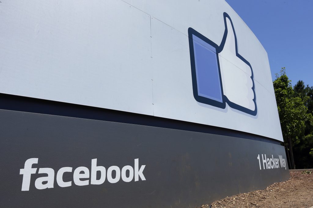 Facebook This July 16, 2013 file photo shows a sign at Facebook headquarters in Menlo Park, Calif. Facebook said in a Thursday, May 23, 2019 report, it removed more than 3 billion fake accounts from the service in the October-March period, although it doesn’t say how many it also missed. The report comes as Facebook grapples with challenges ranging from fake news to its role in elections interference, hate speech and incitement to violence in the U.S., Myanmar, India and elsewhere. (Ben Margot/AP Photo, File)