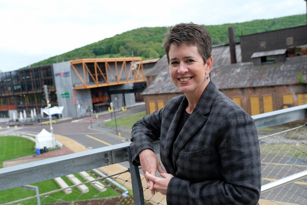 Bethlehem Steel Martin Tower Implosion 33 ArtsQuest President and CEO Kassie Hilgert stands on the SteelStacks campus, which sits at the base of the former blast furnaces of Bethlehem Steel. (Matt Smith for Keystone Crossroads)