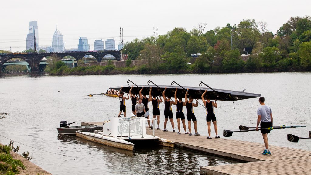 D_V_Regatta-10 West Point Men's Crew prepares to put their boat in the water Friday during the Dad Vail Regatta. (Brad Larrison for WHYY, file)