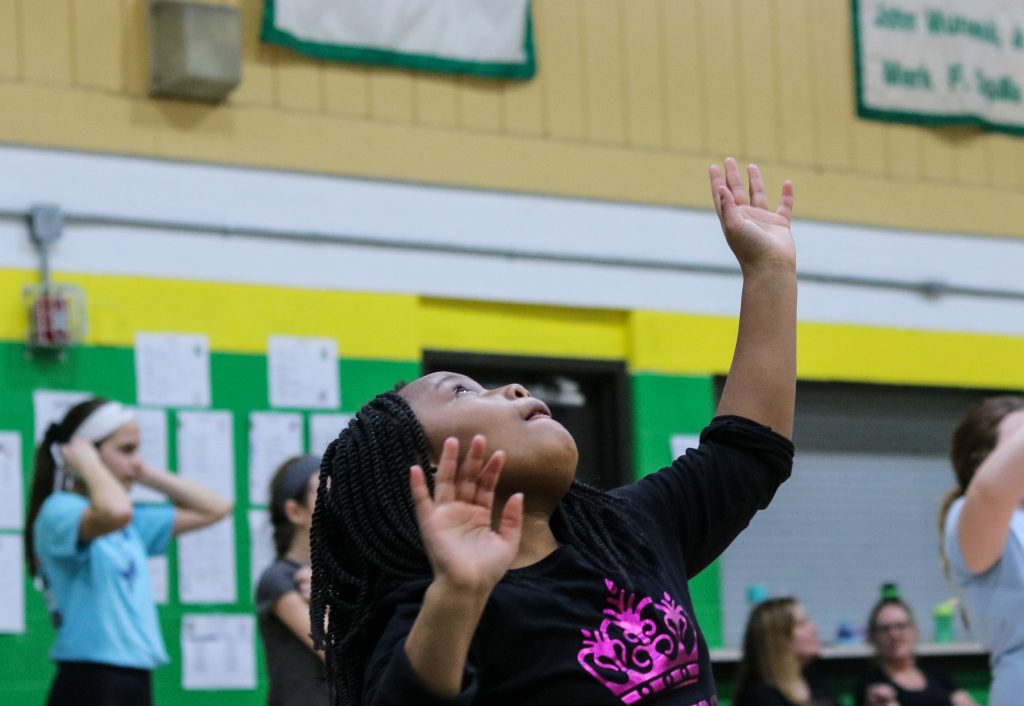 EOM_Volleyball5-rs2 Faith Green practices setting volleyballs at a sports clinic through Philly Girls in Motion. (Angela Gervasi for WHYY)