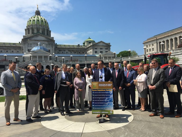 A group of state Senators touts passage of a package of bills aimed at helping farmers. (Katie Meyer/WITF)