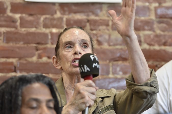 Sue Africa, who lost her son in the May 1985 bombing of the Osage Avenue MOVE house, responds to a question during the press conference. (Jonathan Wilson for WHYY)