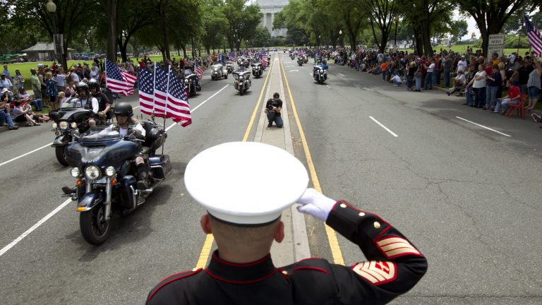 U.S. Marine Tim Chambers salutes to participants in last year's Rolling Thunder motorcycle demonstration. (Jose Luis Magana/AP)