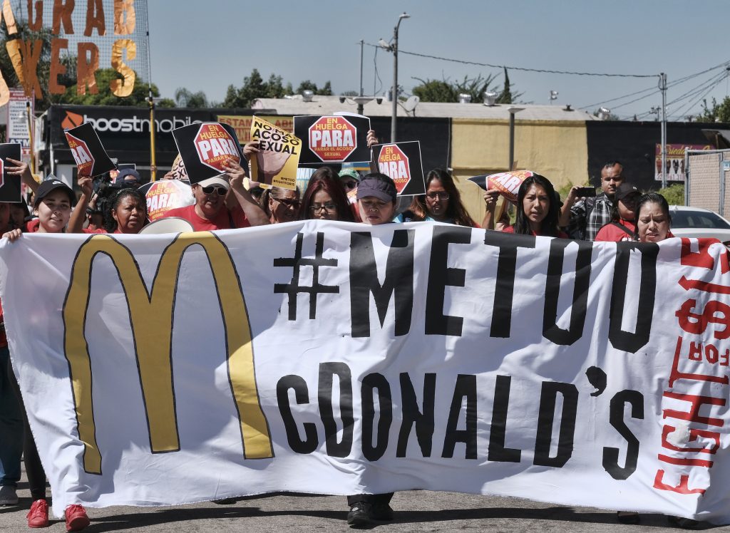 McDonald’s workers marching in Los Angeles in September 2018 as part of a multi-state strike seeking to combat sexual harassment in the workplace. McDonald's workers marching in Los Angeles in September 2018 as part of a multi-state strike seeking to combat sexual harassment in the workplace. (Richard Vogel/AP)