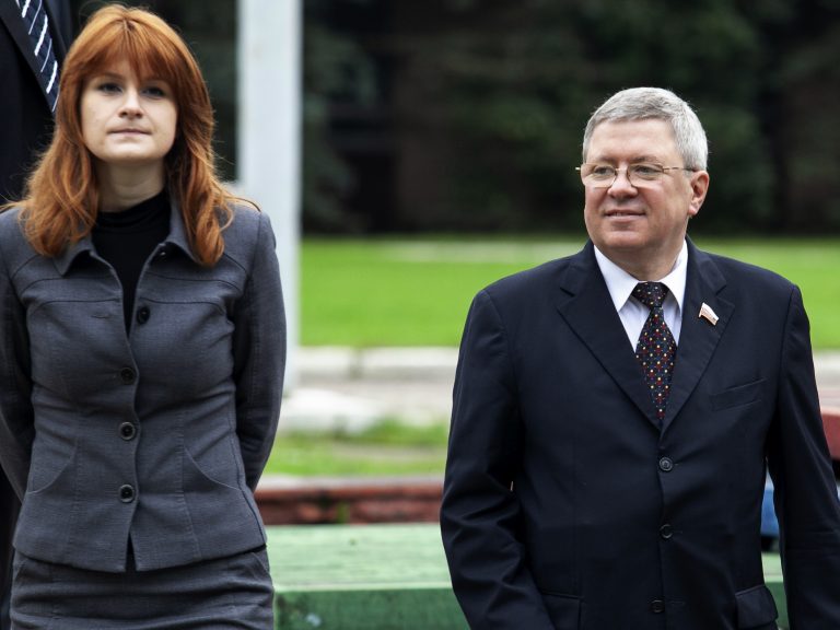 Maria Butina with mentor Alexander Torshin, then a member of Russia's upper house of parliament, in Moscow in 2012. The two sought political influence in the United States. (Pavel Ptitsin/AP)