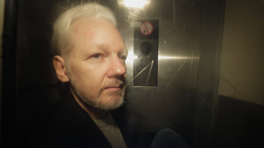 WikiLeaks founder Julian Assange is taken from court, where he appeared on charges of jumping British bail seven years ago, in London on May 1. WikiLeaks founder Julian Assange is taken from court, where he appeared on charges of jumping British bail seven years ago, in London on May 1. (Matt Dunham/AP)