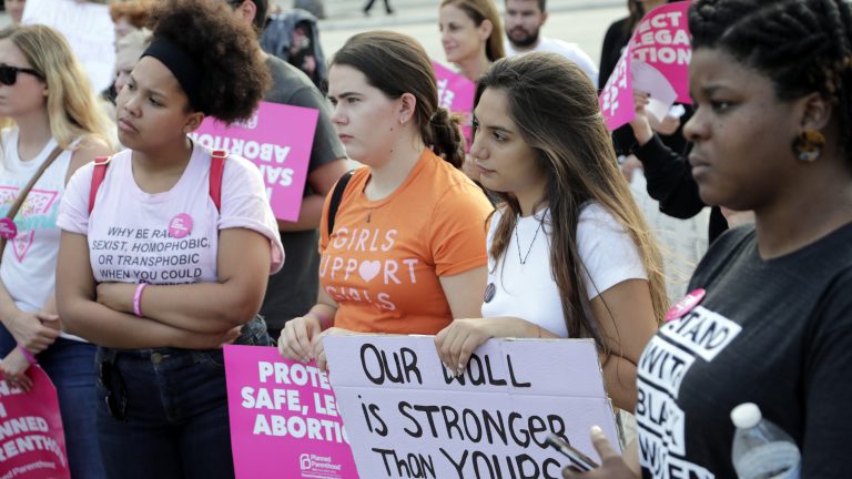 Demonstrators listen to speeches during a rally in support of abortion rights on Thursday in Miami. (Lynne Sladky/AP Photo)