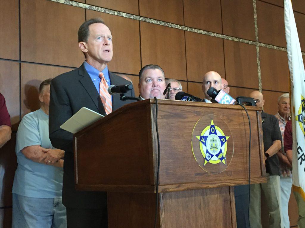 file1 Pennsylvania Senator Pat Toomey has reintroduced the Thin Blue Line Act. Some say it will bring justice for slain cops. Others think it’s an empty political gesture. (Avi Wolfman-Arent/WHYY)