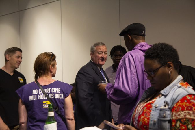 Philadelphia Mayor Jim Kenney greets supporters from SEIU at his campaign's party at the Jewish History museum Tuesday night. (Kimberly Paynter/WHYY)
