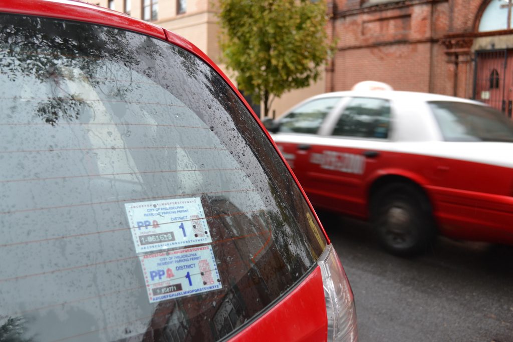 residential-parking-permit-philadelphia-parking-authority.original A residential parking permit on the back of a car