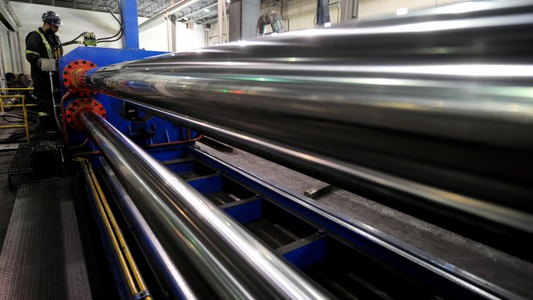 The U.S. is lifting tariffs on Canadian and Mexican steel imports, nearly a year after imposing the duties. Here, a worker is seen at Bri-Steel Manufacturing, which makes seamless steel pipes, in Edmonton, Alberta, Canada. (Candace Elliott/Reuters)