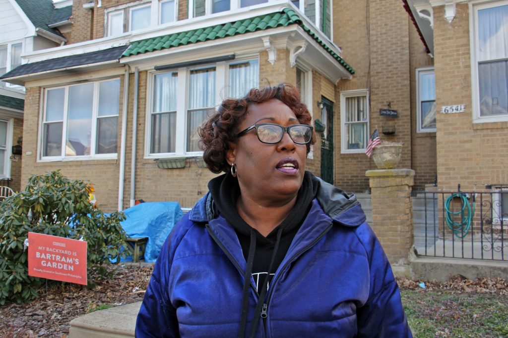 IMG_4239 Tracey Gordon stands in front of homes in her Southwest Philadelphia neighborhood. (Emma Lee/WHYY)