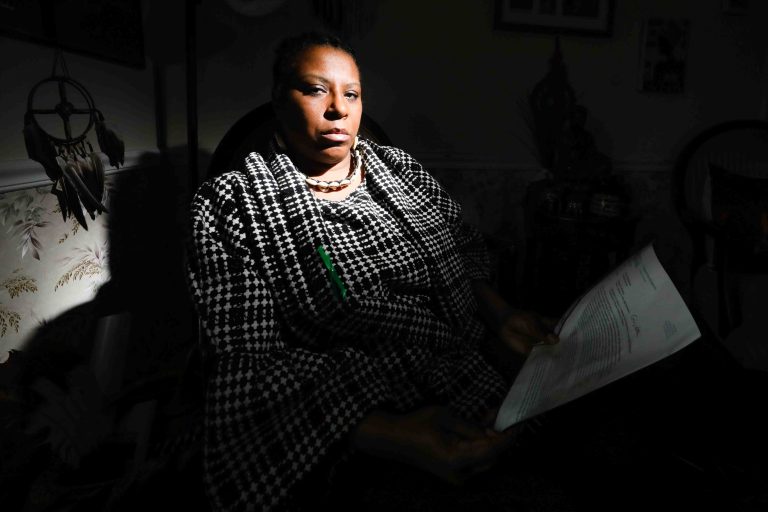 Former UD professor Arica Coleman in her home Wednesday. Feb. 27, 2019, in Newark, Del.  (Saquan Stimpson for WHYY)