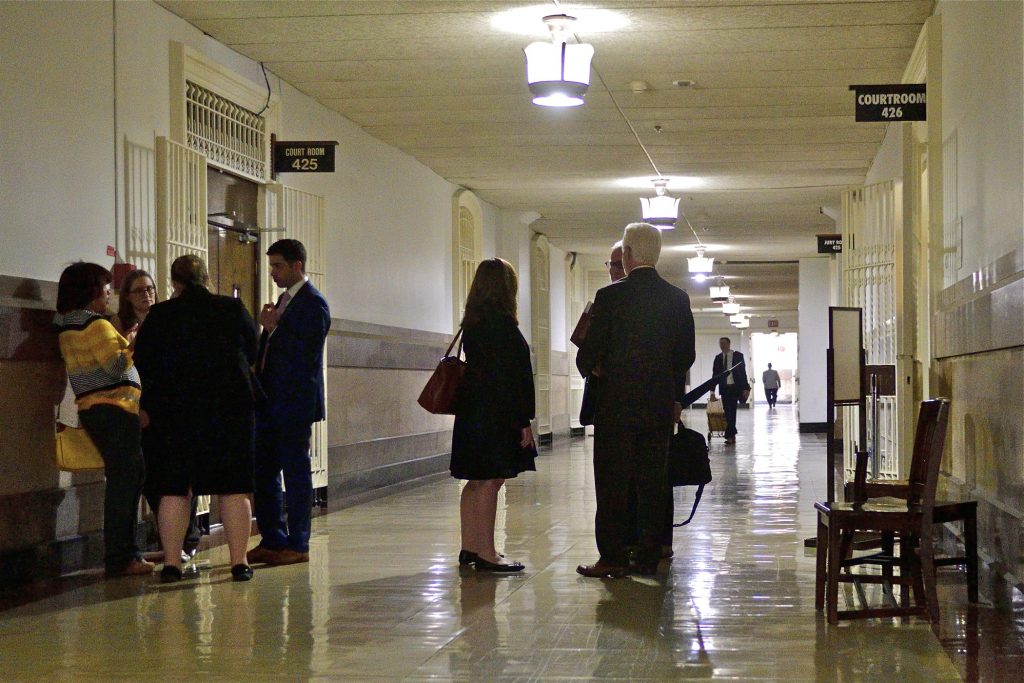 2019 05 23-b slabbers-first district court Lawyers gather in the hallway at Philadelphia City Hall that houses the First Judicial District of Pennsylvania. A computer virus has shut down the court's website. (Bastiaan Slabbers for WHYY)