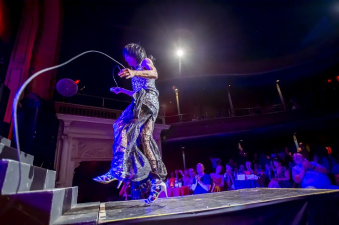 Helen Back prances around the stage and runway. (Jonathan Wilson for WHYY)
