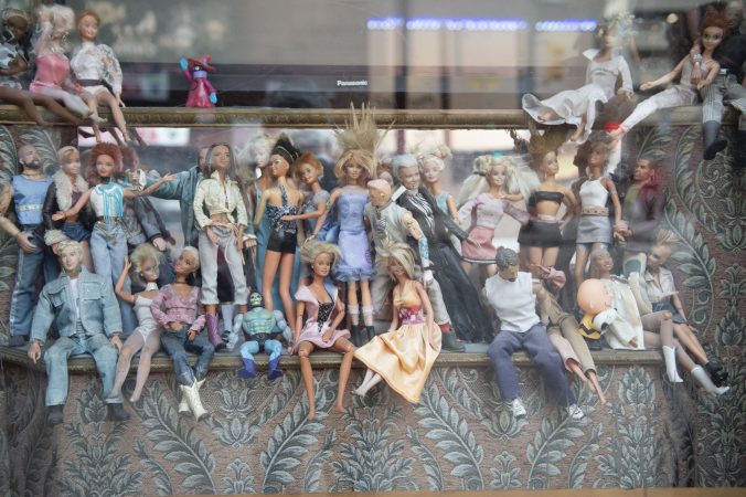 In one of the Troc’s windows is a collection of dolls dressed as performers. (Jonathan Wilson for WHYY)