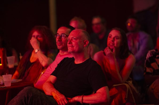 Audience members watch The Big Mess Dancers. (Jonathan Wilson for WHYY)