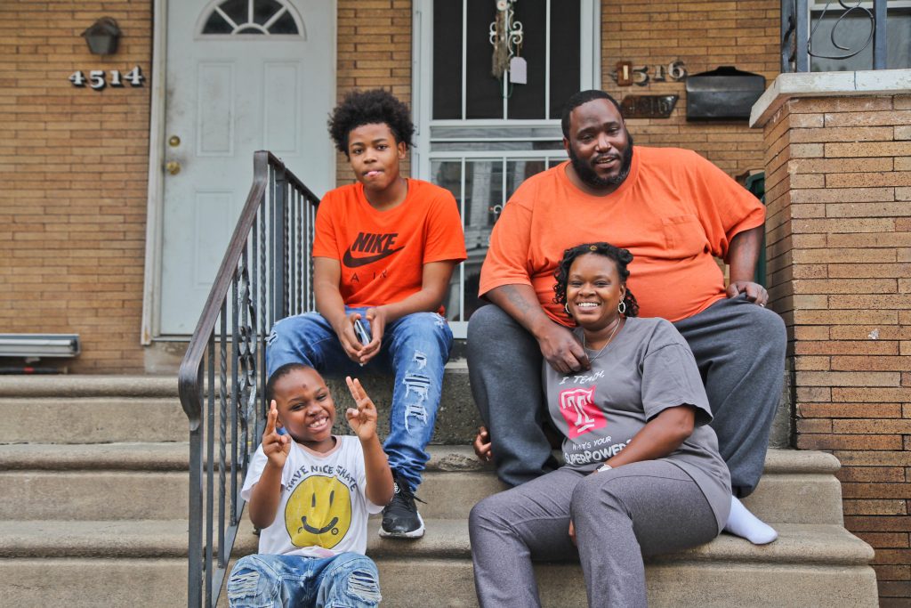 2019 06 14 janel turner Janel Turner, (bottom right), her husband, and two of her sons, at their home in Philadelphia’s Nicetown neighborhood. (Kimberly Paynter/WHYY)