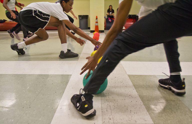 Students at Philadelphia’s Constitution High School face off during dodgeball. (Kimberly Paynter/WHYY)
