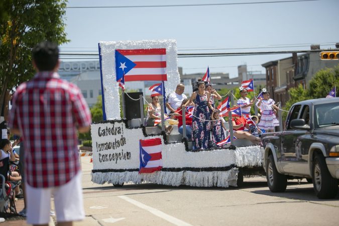 Thousands gather at the Camden’s waterfront to celebrate the San Juan Bautista Parade and Festival. The parade has been a tradition in the city for the past 62 years. (Miguel Martinez/WHYY)