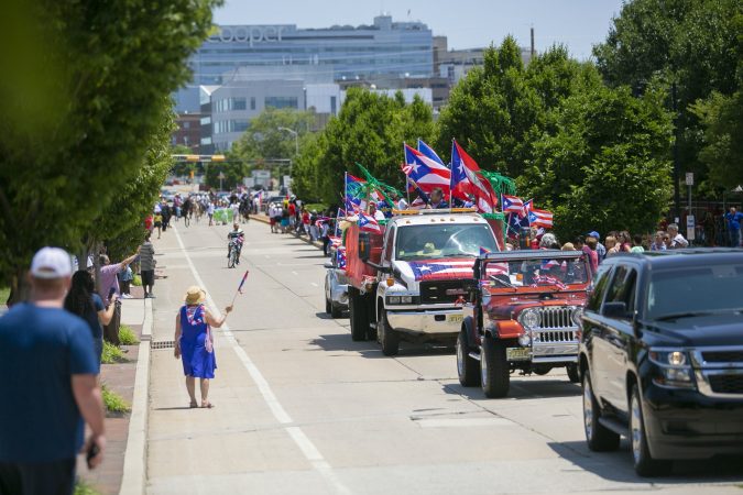 Thousands gather in Camden to celebrate the San Juan Bautista Parade and Festival. (Miguel Martinez/WHYY)