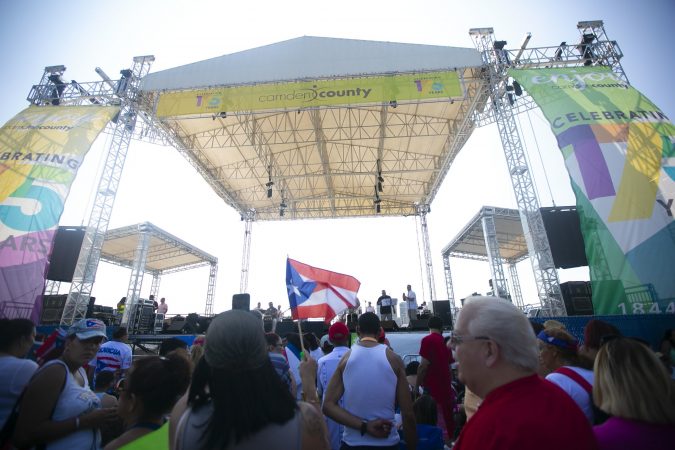 Thousands gather at the Camden’s waterfront to celebrate the San Juan Bautista Parade and Festival. The parade has been a tradition in the city for the past 62 years. (Miguel Martinez/WHYY)