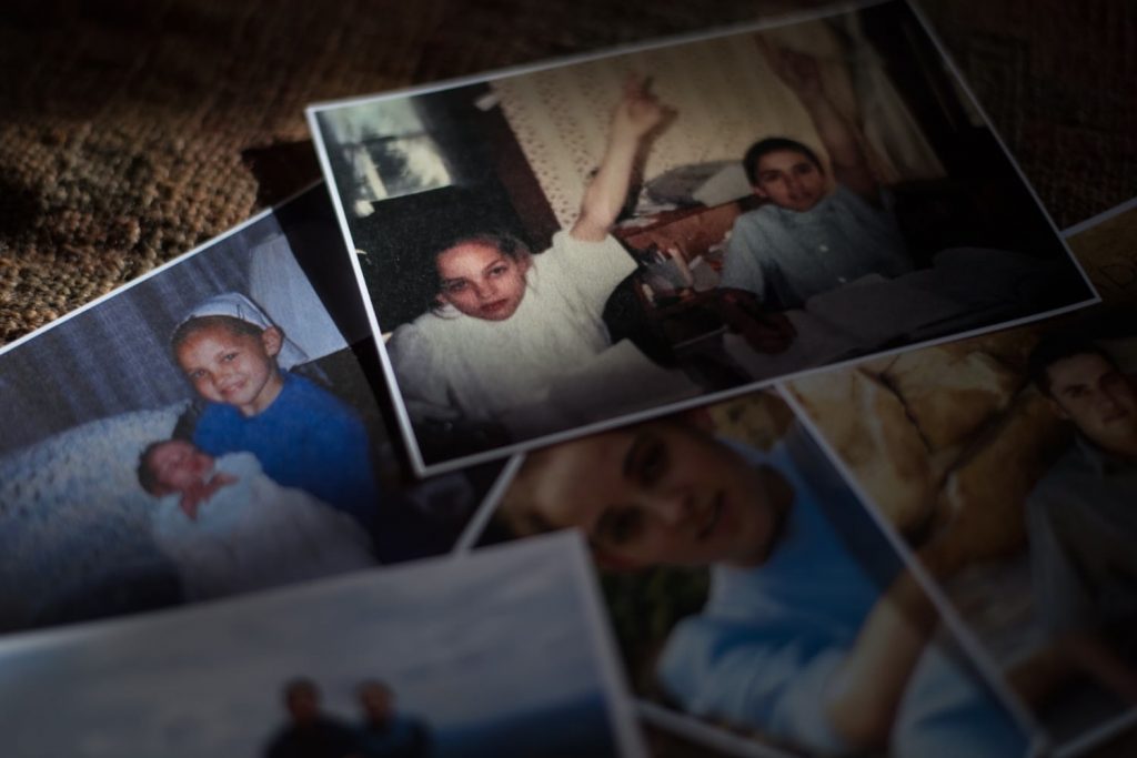 20190519sms At top, a family photo of Martha Peight, left, at 13 years old, and her brother, Jesse Hostetler, right, at 14, work on their homeschooling lessons sometime between January and May 2002 at their home in Alexandria. Around the time of this photo is when Martha’s father started abusing her, she says. (Courtesy of Martha Peight.)