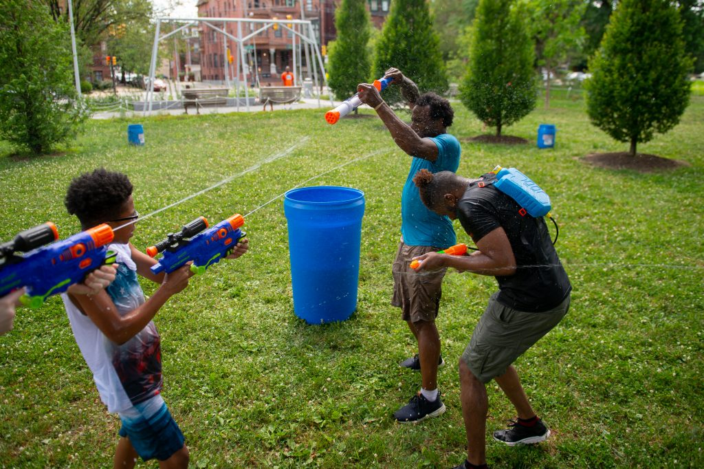 Families from across Philadelphia came to Fairmount Park to participate in the Water Fight Philly event on Sunday, June 30, 2019. (Kriston Jae Bethel for WHYY)
