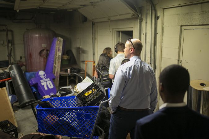 A group tours the Camden High School athletic facilities on Thursday, June 6, 2019 (Miguel Martinez for WHYY)
