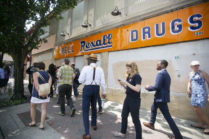 A group of activists gather for a tour of Camden to show the inequality in the city even after new businesses moved in (Miguel Martinez for WHYY)
