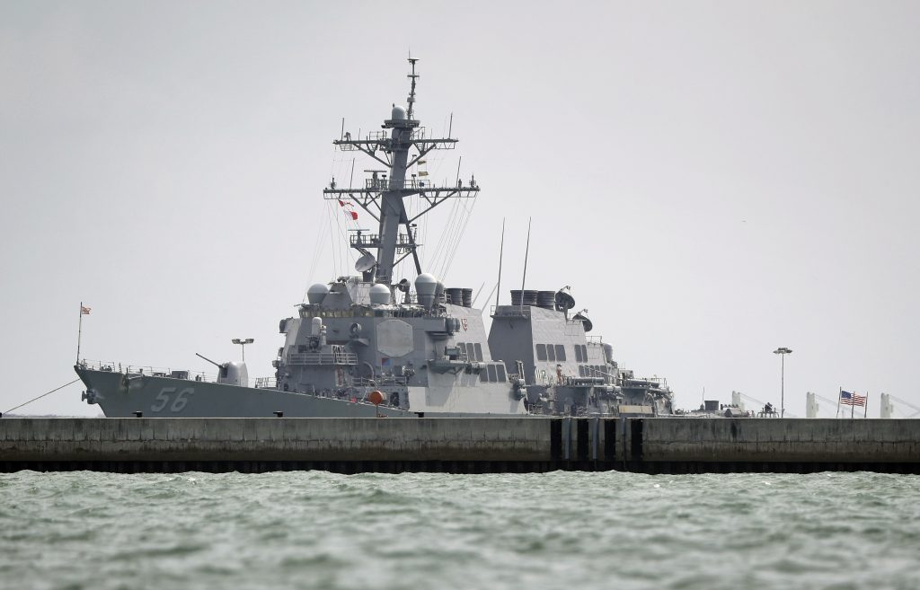 The USS John S. McCain is seen docked at Changi naval base  on Monday, Aug. 21, 2017 in Singapore. (AP Photo/Wong Maye-E)
