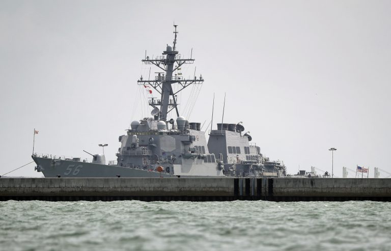 The USS John S. McCain is seen docked at Changi naval base  on Monday, Aug. 21, 2017 in Singapore. (AP Photo/Wong Maye-E)