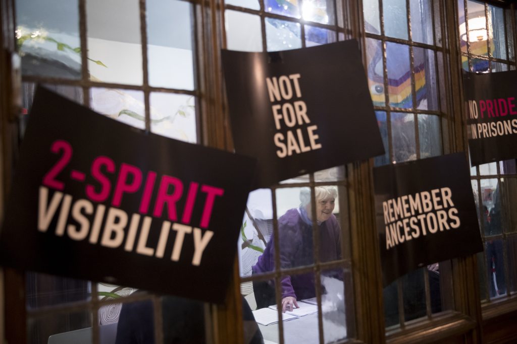 Stonewall at 50 Alternative March In this Wednesday, March 27, 2019, photo, a participant checks in as she arrives for a meeting of the Reclaim Pride Coalition at the Church of the Village in New York. Activists who believe New York City’s annual LGBTQ Pride march has become too commercialized are staging an alternative march the same day. The two marches through Manhattan streets will take place Sunday, June 30, the last day of a month of celebrations marking the 50th anniversary of the 1969 Stonewall uprising. (Mary Altaffer/AP Photo)