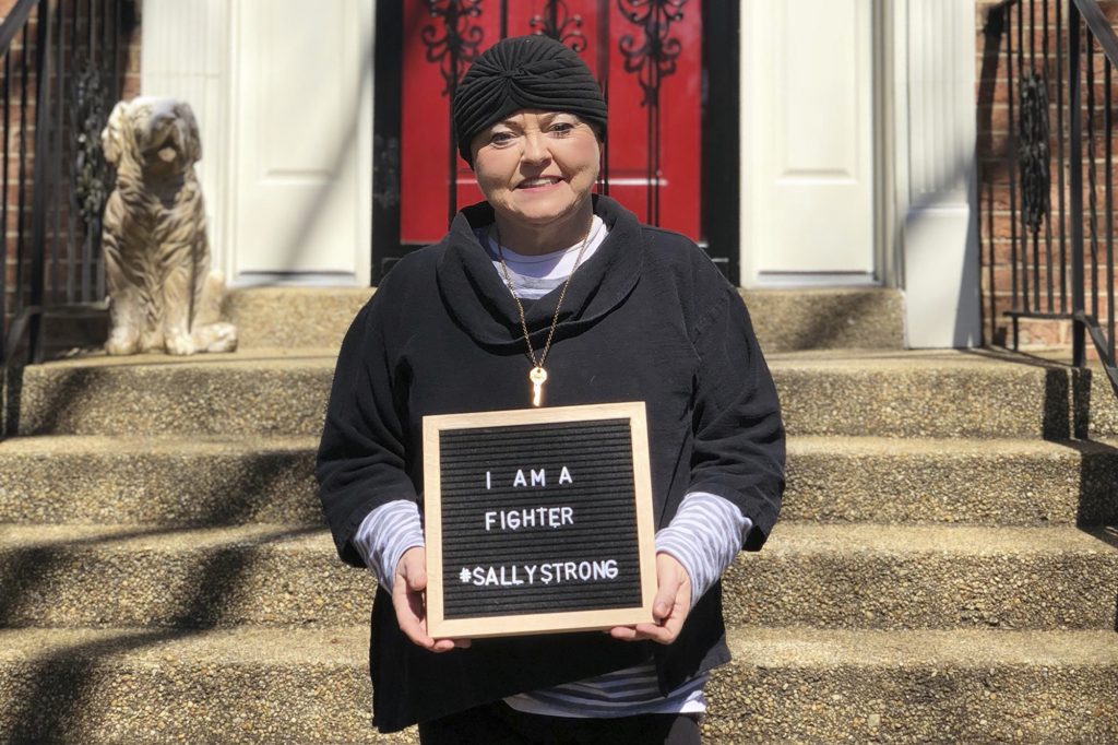 Cancer Drugs Access This March 26, 2018 photo provided by Ashley Atwater, left, shows her mother, Sally Atwater, in the Georgetown area of Washington, a few days after leaving the hospital. (Courtesy Ashley Atwater via AP)