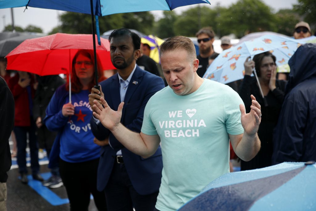 People gather for a vigil in response to a fatal shooting at a municipal building in Virginia Beach, Va., Saturday, June 1, 2019. A longtime city employee opened fire at the building Friday before police shot and killed him, authorities said. (Patrick Semansky/AP Photo)