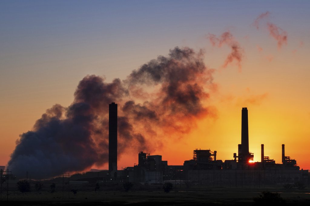 Trump Coal Power Plants In this July 27, 2018, file photo, the Dave Johnson coal-fired power plant is silhouetted against the morning sun in Glenrock, Wyo. (J. David Ake/AP Photo)