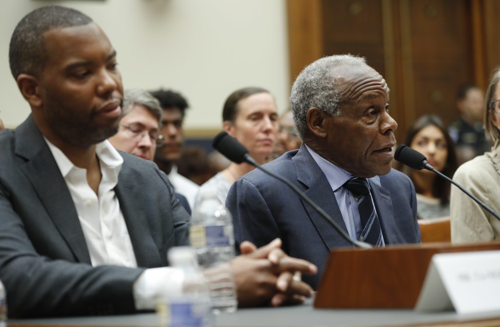 Danny Glover, Ta-Nehisi Actor Danny Glover, right, and author Ta-Nehisi Coates, left, testify about reparation for the descendants of slaves during a hearing before the House Judiciary Subcommittee on the Constitution, Civil Rights and Civil Liberties, at the Capitol in Washington, Wednesday, June 19, 2019. (Pablo Martinez Monsivais/AP Photo)
