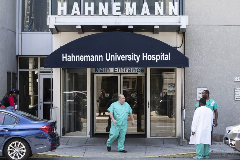 A person exits Hahnemann University Hospital in Philadelphia, Wednesday, June 26, 2019.  (AP Photo/Matt Rourke)